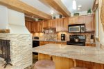 Fully equipped kitchen with granite countertops 